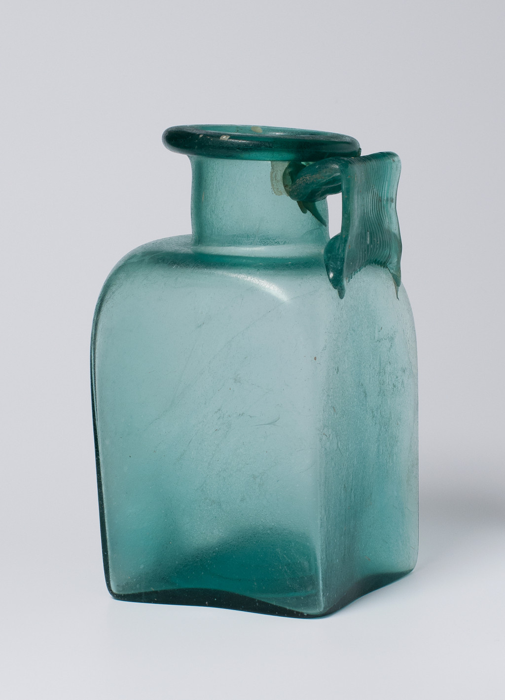 Square one-handled bottle, ash urn